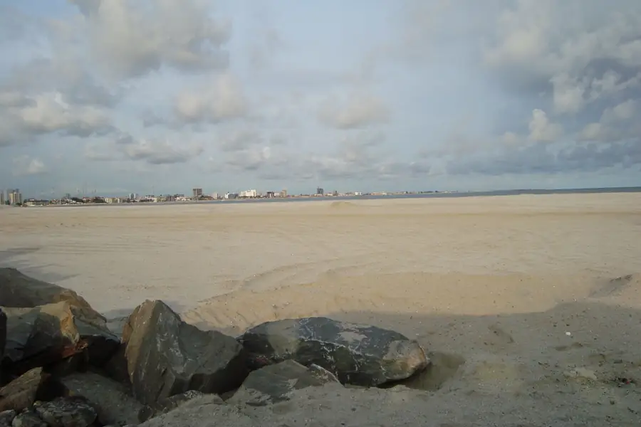 Reclaimed sand at Eko Atlantic in Lagos with the Victoria Island skyline visible across the site