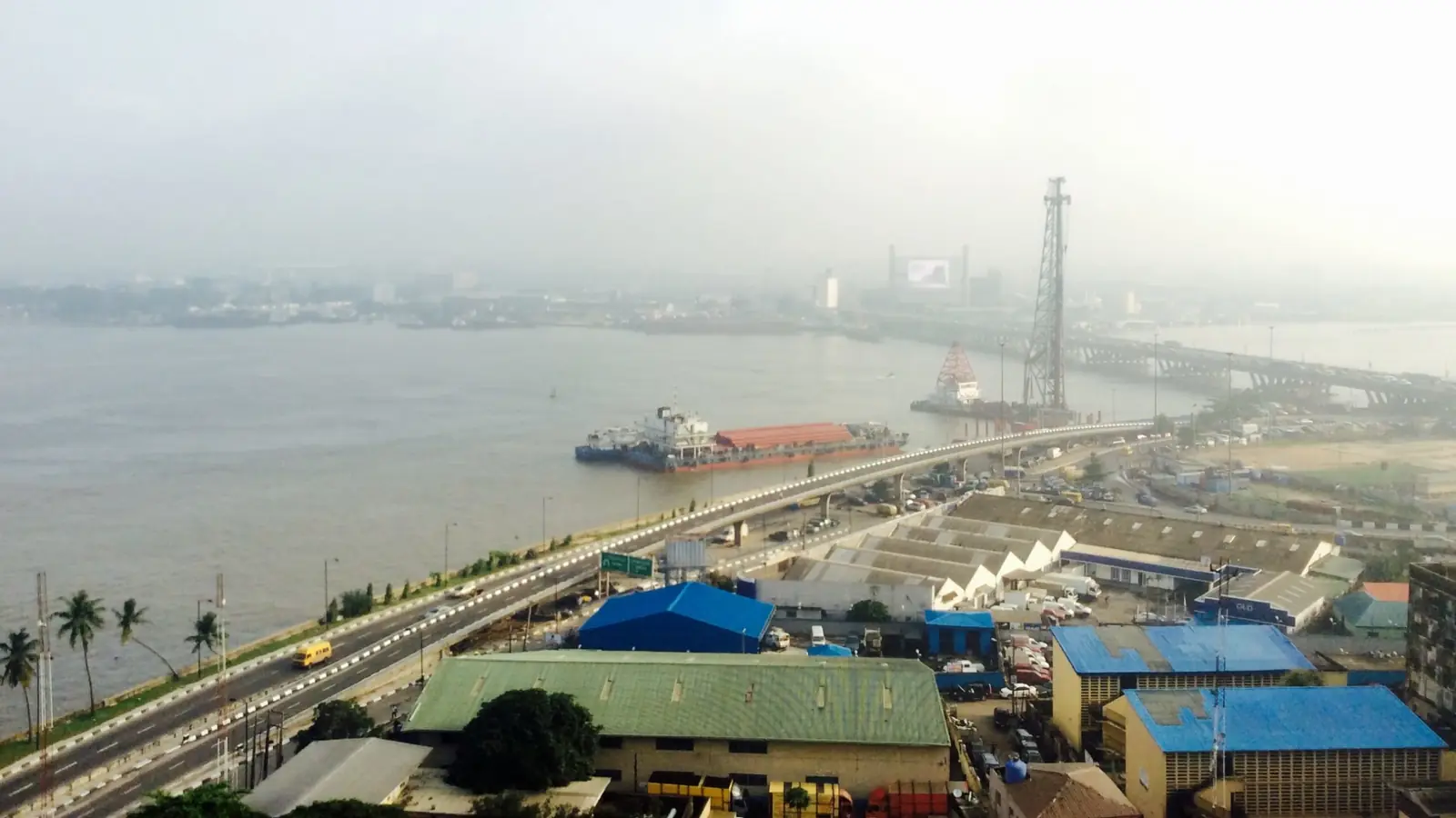 The Lagos Island marina waterfront with the harbour and Third Mainland Bridge behind