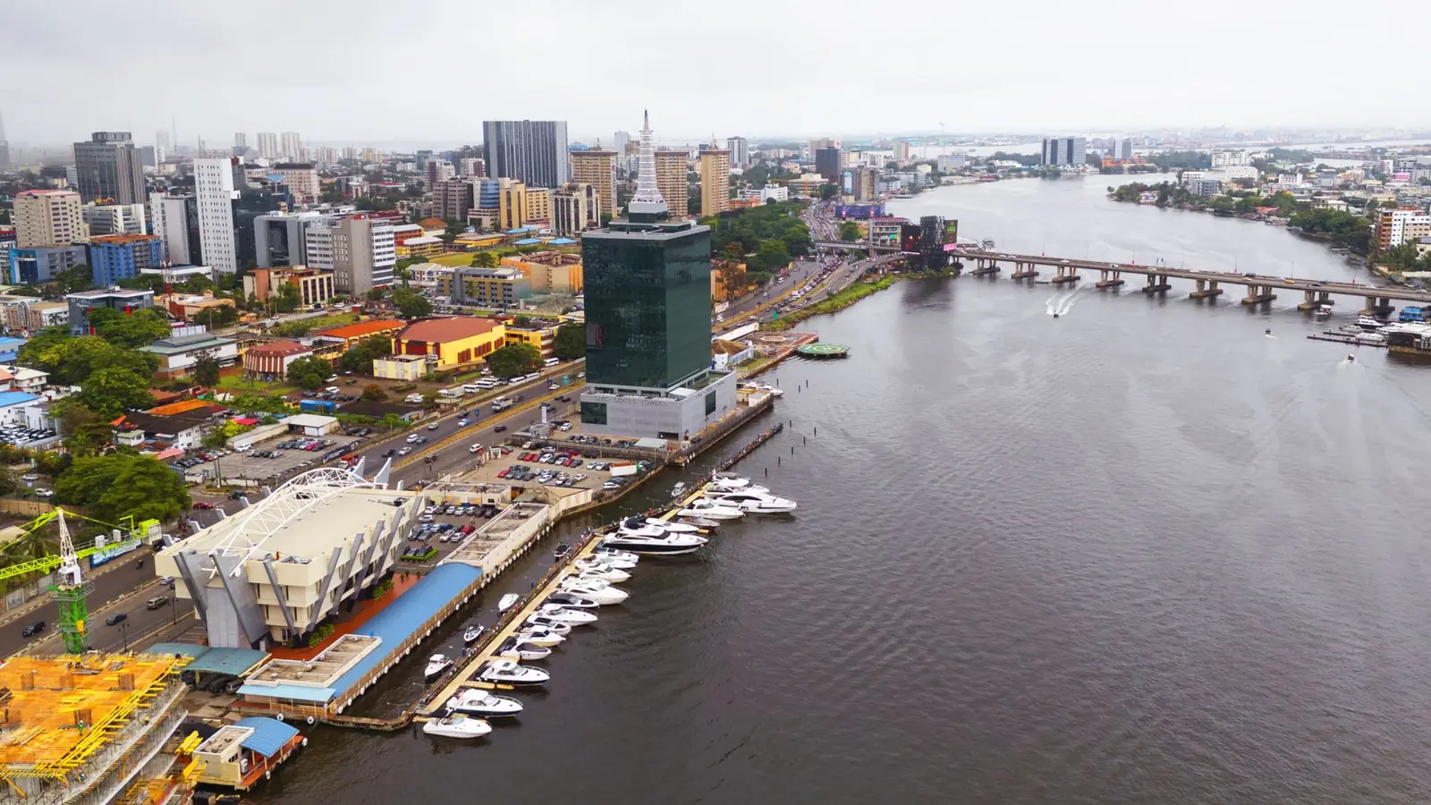 Aerial view of Victoria Island in Lagos showing office towers, the marina and moored yachts on the lagoon